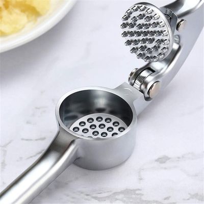Dapur Berkelanjutan Harus Memiliki Chrome-Faced Zinc Alloy Manual Garlic Press untuk Hasil