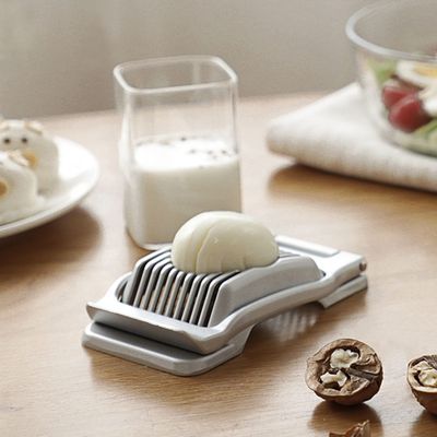 Pemasok Alat Dapur Pemotong Telur Logam Handheld Stainless Steel Wire Egg Slicer Untuk Telur Rebus Kekerasan