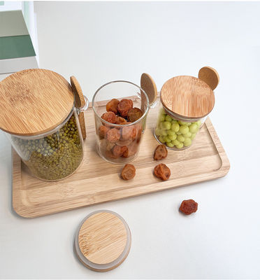 Kontainer penyimpanan makanan rak kaca bening dengan desain fungsional dan tutup bambu bulat