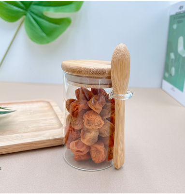 Makanan Botol Bambu Kaca Bulat Dengan Tutup Dan Sapi Permen Rempah Kopi Kacang Kacang Kue